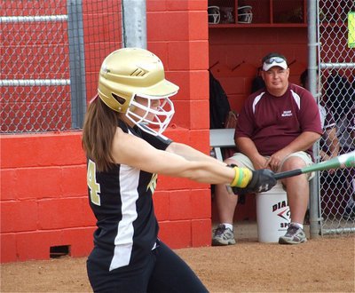 Image: Drew delivers — Drew Windham hits a single in the top of the 5th inning against DeLeon.