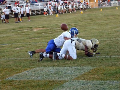 Image: Lions make a play — Italy’s Trevon Robertson(9) tries to haul in a pass for the 2-point conversion.