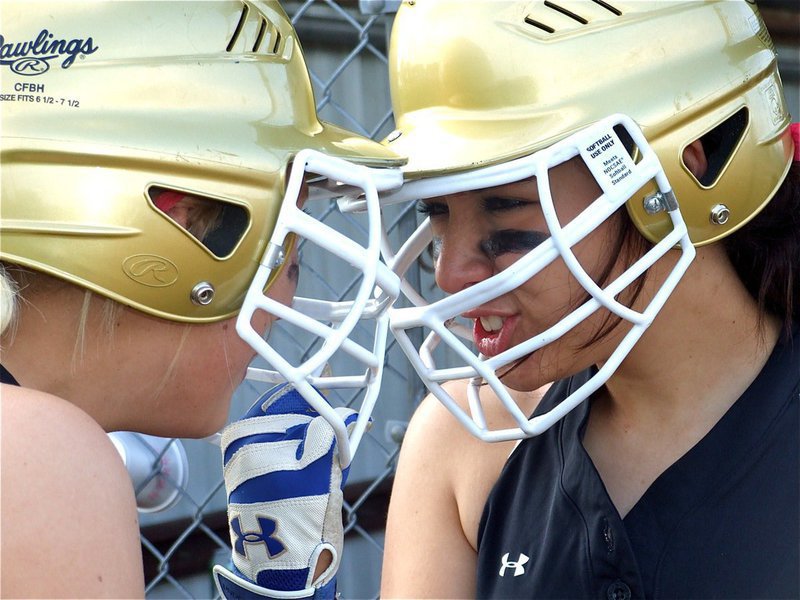 Image: Let’s do this! — Sisters of Smash, Megan and Alyssa Richards, fire each other up before going up to bat.