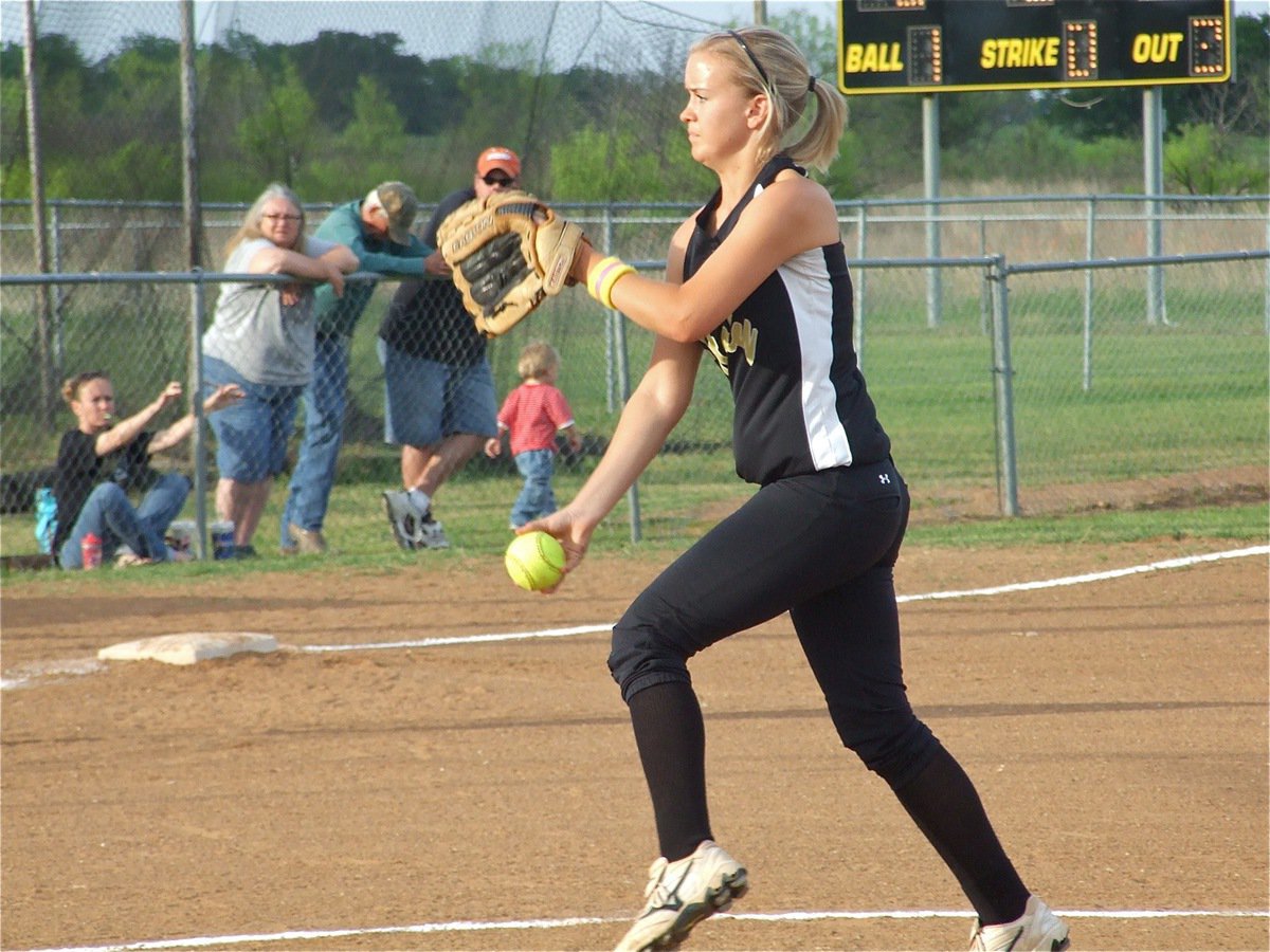 Image: Unleashed — Courtney Westbrook unleashes the heat at a Lady Bulldog batter.