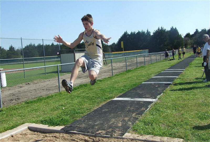 Image: Clear for takeoff — Air Traffic Control had to clear the air space for 8th grader Justin Wood before  he could pilot his way to a 1st place finish in the triple jump.