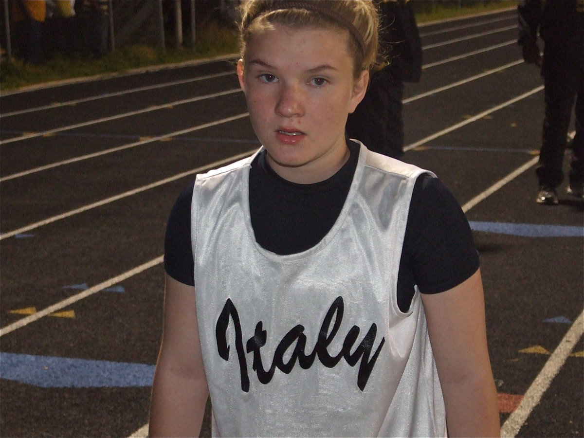 Image: Tara can fly — 7th grader Tara Wallis gets set to compete in the relay.