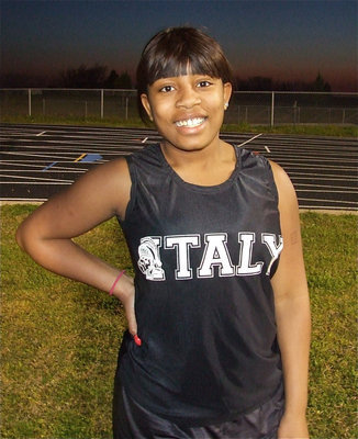 Image: Ashley Harper — 8th grader Ashley Harper crosses the finish line and stops to strike a million dollar pose.