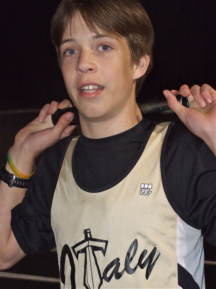 Image: Benjamin Lewis — 7th grader Benjamin Lewis tries to catch his breath after his racing event.
