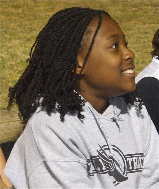 Image: Grin before the win — 7th grader K’Breona Davis is excited about her upcoming race.