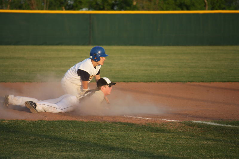 Image: This Eagle landed a  little too short — Milligan grabs the ball and gets this Eagle out on 2nd.