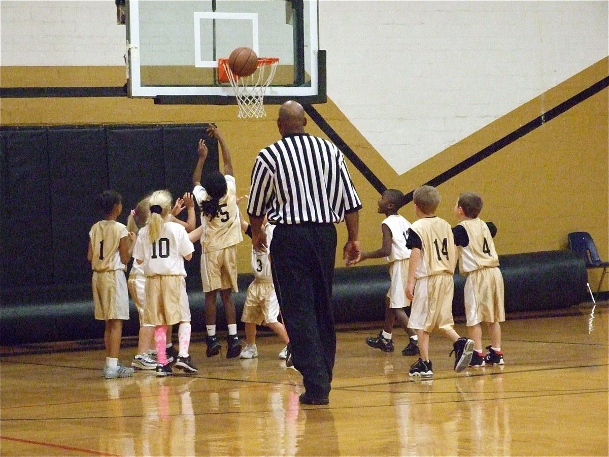 Image: Rebound! — Kambria Brooks(5) puts up a shot for her Italy 9 team during their contest with Italy 10.