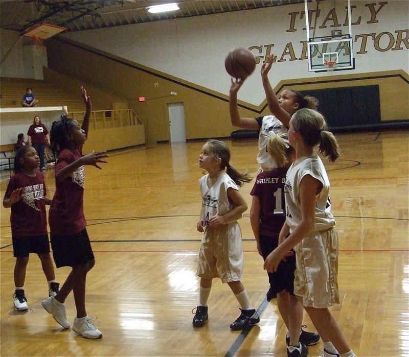 Image: Emily gets points — Emily Cunningham(1) towers above the competition to score 14-points.