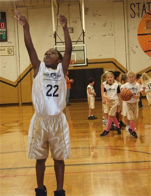 Image: Ricky shoots — Ricky Pendleton(22) practices his jump shooting before the game.