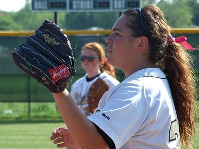 Image: Brashear on first — Nikki Brashear gets loose on first base before the game.