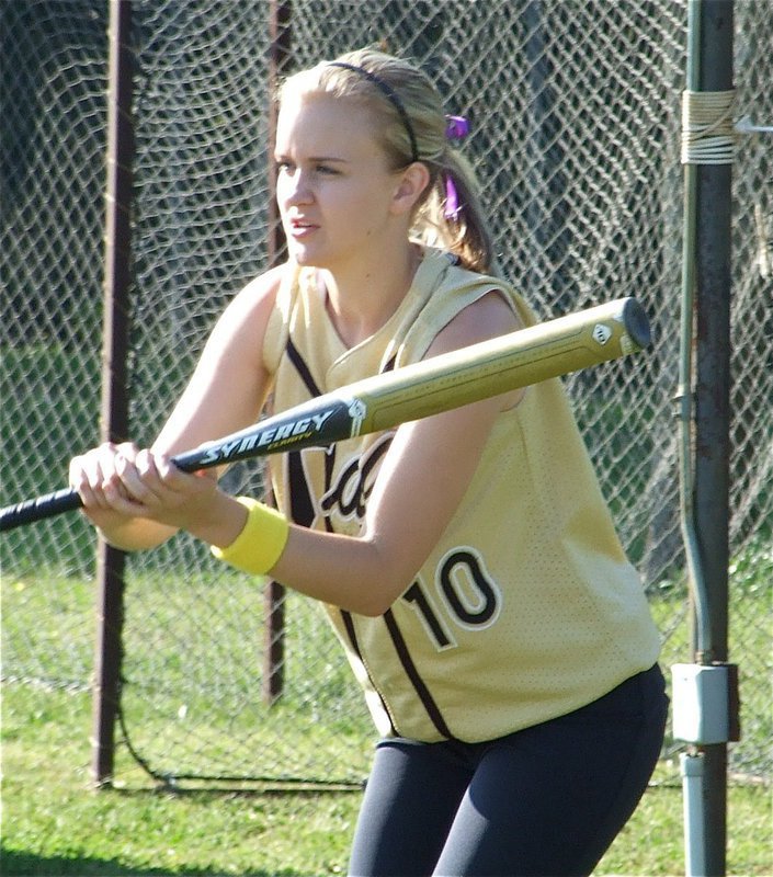 Image: Bunting practice — Courtney Westbrook takes a few practice bunts before taking the field against Waco Reicher.