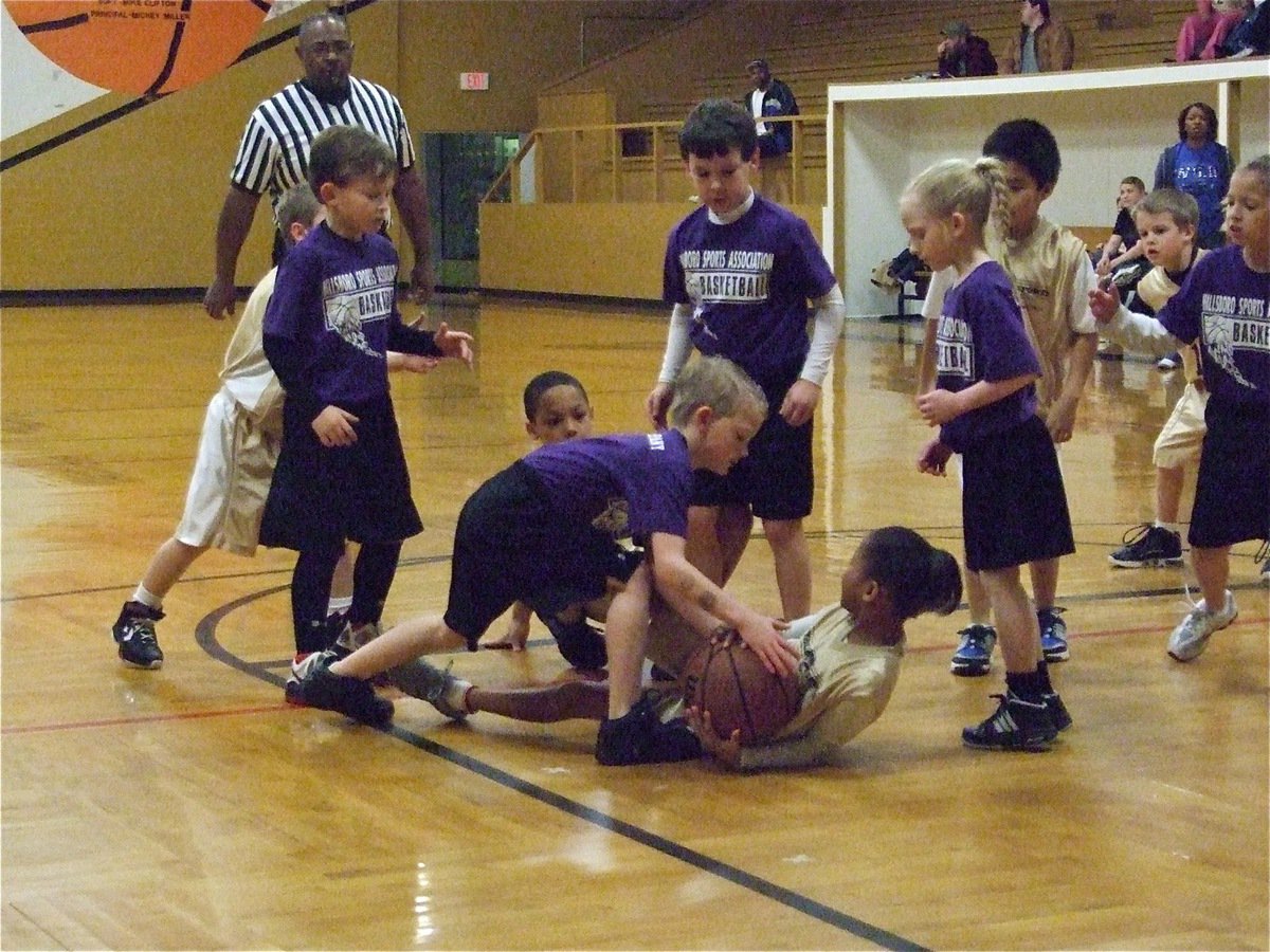 Image: Destani battles — Destiny Harris(1) goes to the floor in a battle for the loose ball.