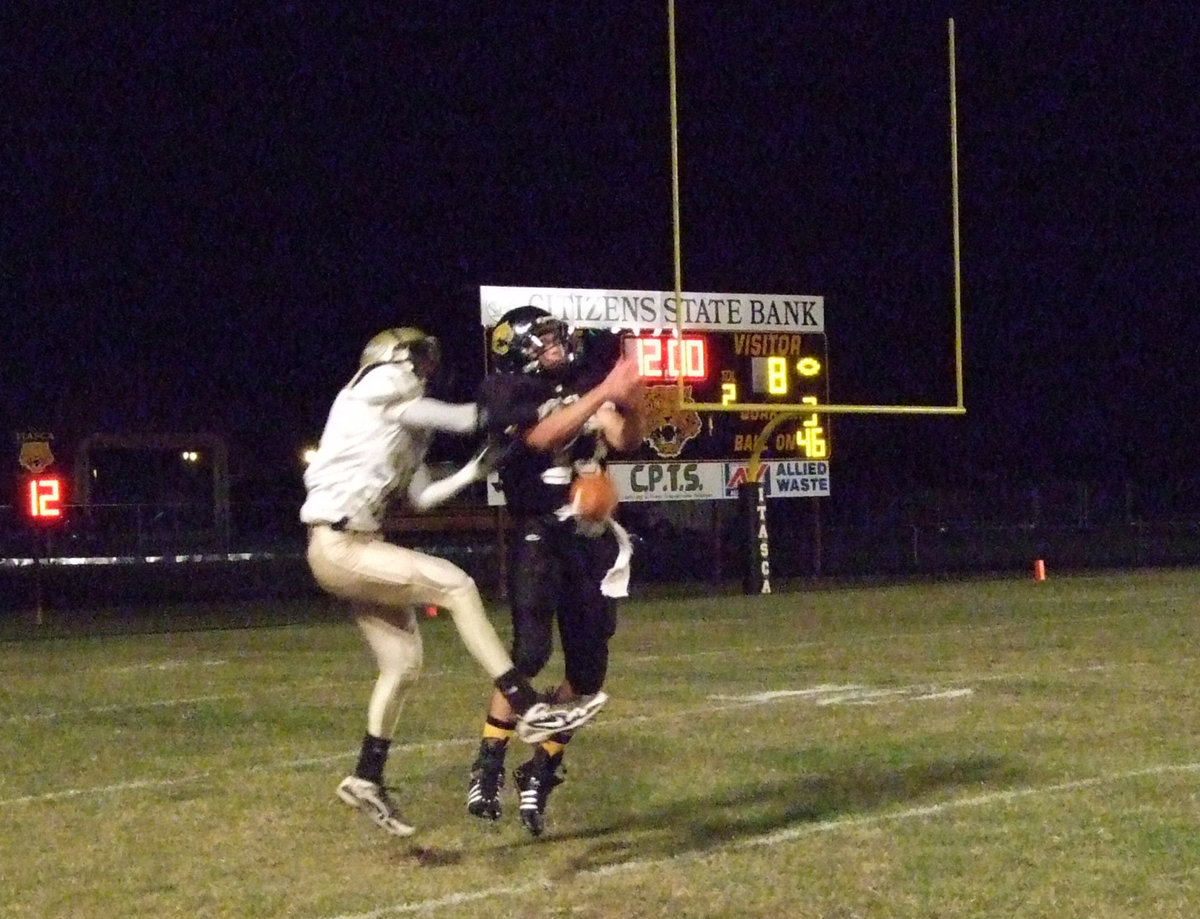 Image: Itasca blocks — Itasca’s Gregory Mason(13) knocks down a pass intended for Italy’s John Isaac(10) who was able to grab Mason’s arm to keep him from making the pick.