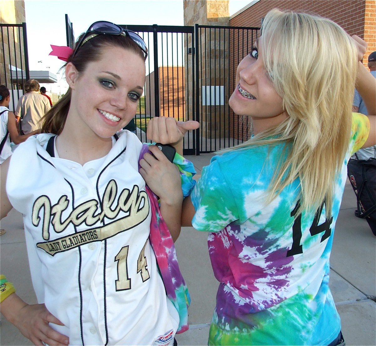 Image: Drew and Sierra — Drew Windham celebrates with Sierra Harris as the Lady Gladiators exit the Fort Worth Brewer field on Friday a 1-0 lead in the series against Tolar.