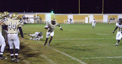 Image: Desmond almost breaks away — Desmond Anderson(8) almost breaks away down the sideline but gets nudged out in the first quarter.