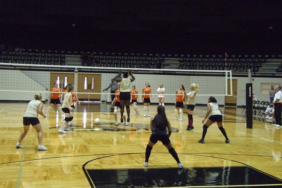 Image: Avalon vs JV Gladiators — JV jumps to stop the ball.