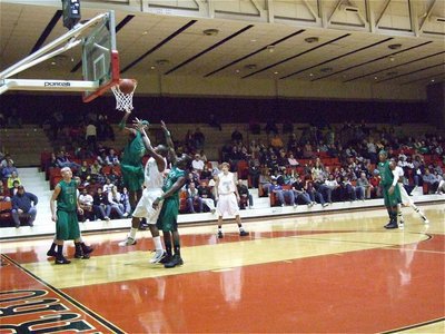 Image: Jasenio scores — Jasenio Anderson(11) was in attack mode against the Bobcats.