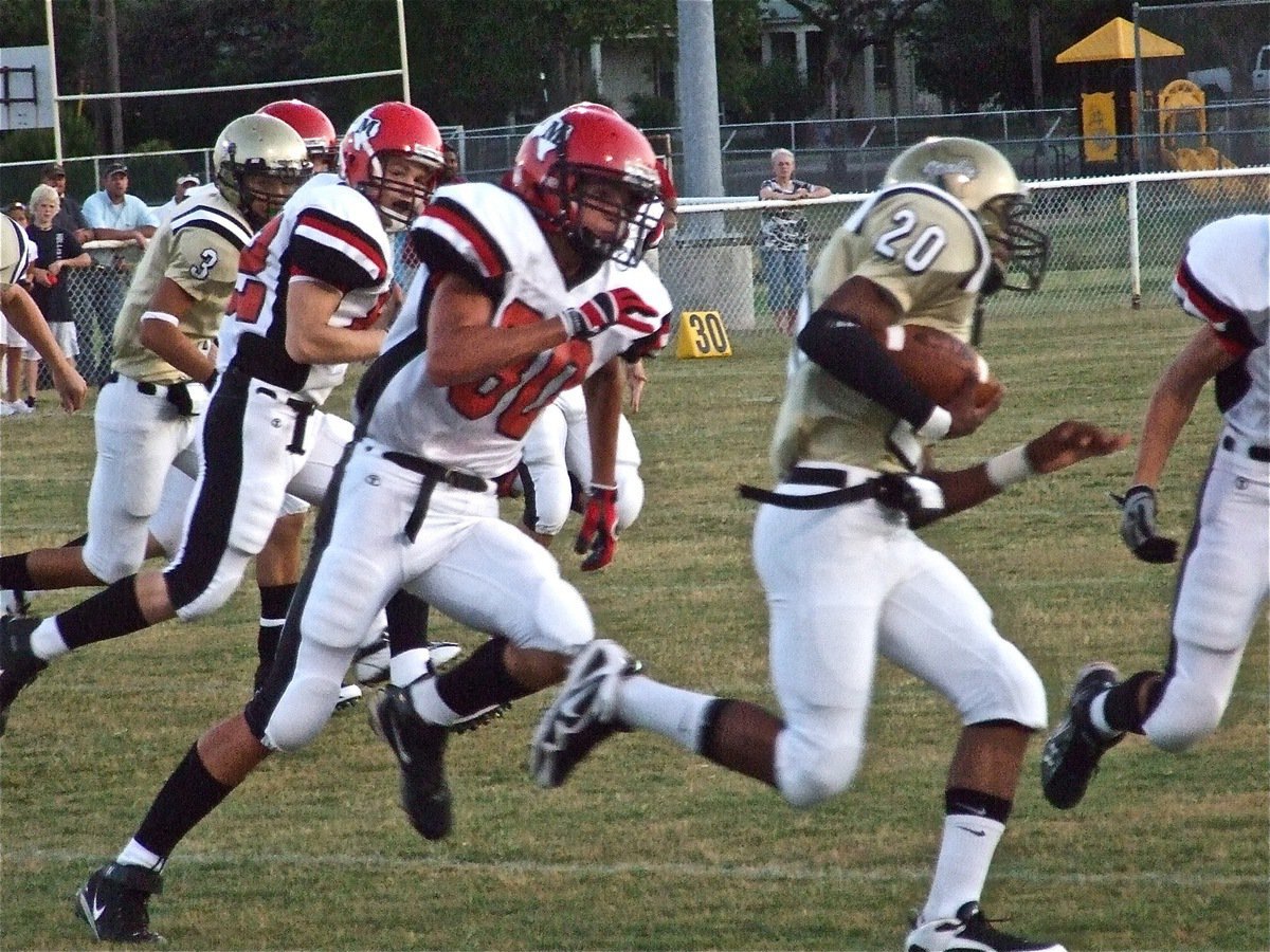Image: Kick return — De’Andre Sephus advances the Maypearl kickoff.