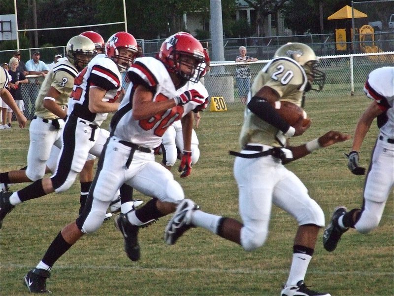 Image: Kick return — De’Andre Sephus advances the Maypearl kickoff.