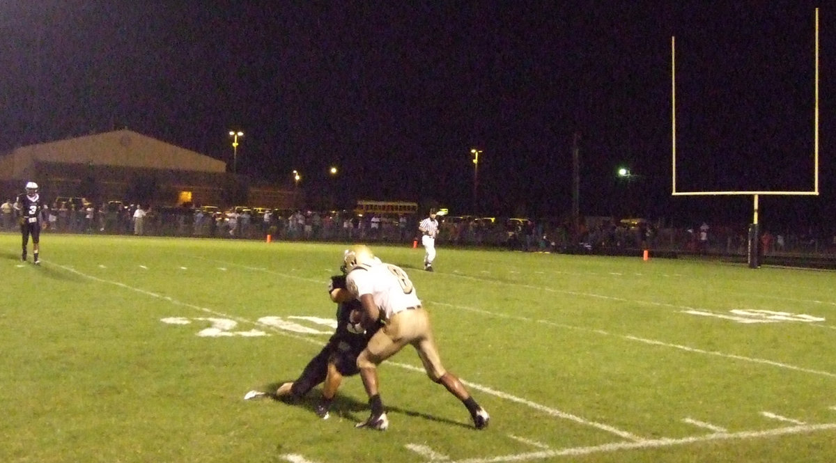 Image: Dez does it — Senior Desmond Anderson(8) makes a sideline catch for a 1st down.