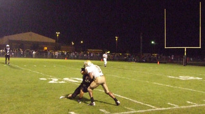 Image: Dez does it — Senior Desmond Anderson(8) makes a sideline catch for a 1st down.