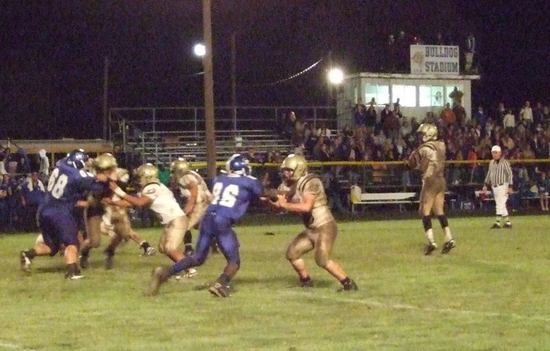 Image: Time to survey — Jasenio Anderson looks to pass against Wortham.