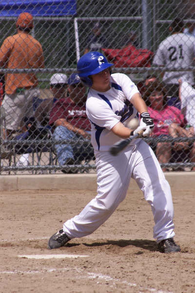 Image: John Byers connects — John Byers of Italy not only connected with baseballs during the World Series tournament including this over the fence 2-run home run shot, he also hooked up for a quick visit with his cousin Zain Byers of Italy who was nearby visiting family in Colorado.
