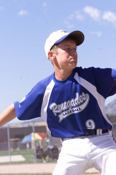 Image: Lane Bogy — Lane anchored the Ellis County Renegades finishing the tournament with a .654 batting average while knocking in 18-RBIs. And by the way, Lane hit his first career home run that sailed over the fence to win the Super Series World Series for his team.