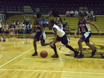 Image: Kendra Dribbles — Italy’s #10 Kendra Copeland tries to outrun the Mustangs.