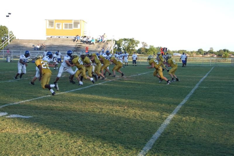 Image: A play begins — The Pirate and Gladiator lines collide and shift as another offensive play for Italy develops.