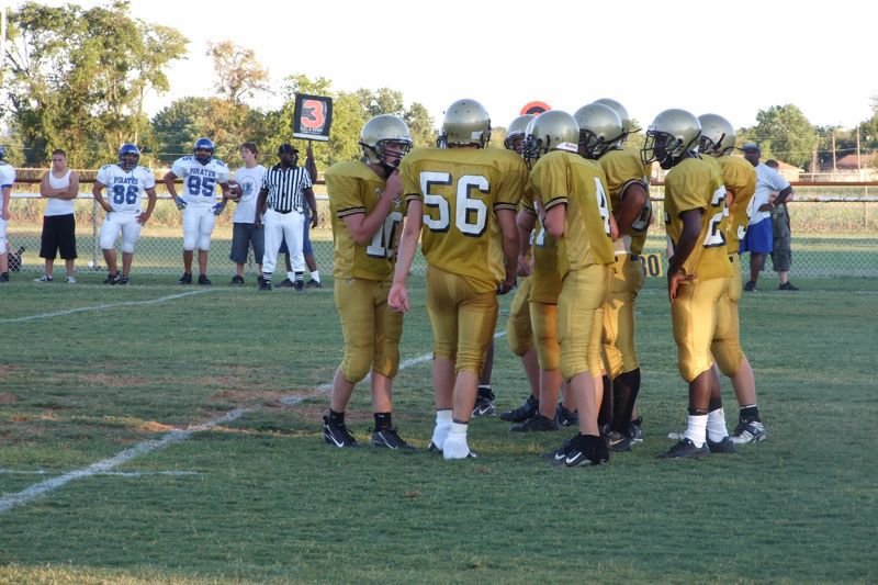 Image: Gladiator huddle — Near the 30 yard line, the Italy offense gathers to set up a third down play.
