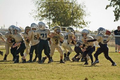 Image: Pass, Pass, Pass! — 3-Jacob Wiser tries to pressure the palmer quarterback near Italy’s own endzone.