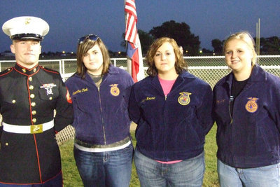 Image: FFA — Jacob Simon, Meredith Brommett, Haley Pittmon, Julia McDaniel waiting for the flag ceremony.