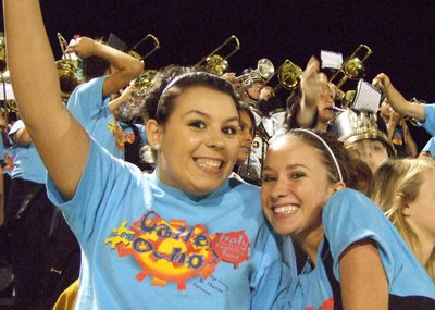 Image: Molly and Tess — Molly Haight and Tess Clark have fun in the stands with the band.