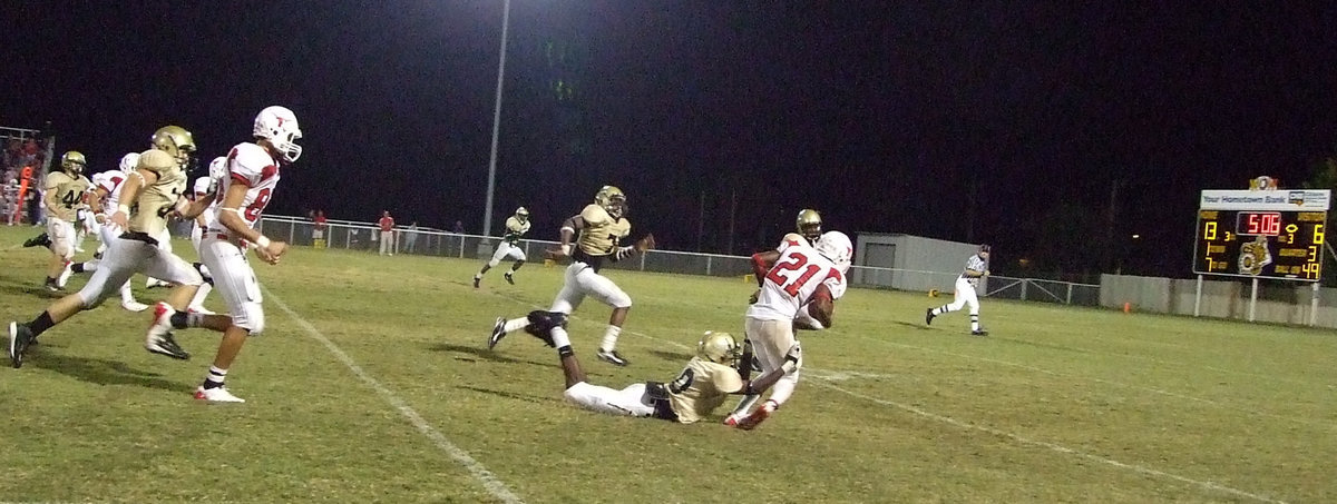 Image: Issac destroys — #10 John Issac pulls the Longhorn down to the ground.