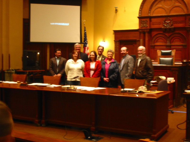 Image: Ellis County District Courtroom — Front Row: Commissioner Dennis Robinson, Sandy Eubank, Amber Hudson, Doris Mitchell, Commissioner Heath Sims, Commissioner Ron Brown  Back Row: Commissioner Bill Dodson, County Judge Chad Adams