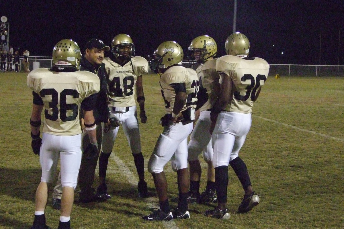 Image: Coach Bales — Bales keeps and understanding with his players.