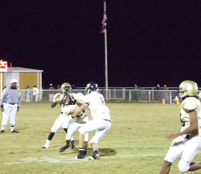 Image: Majors Defends — Clay defends his quarterback.