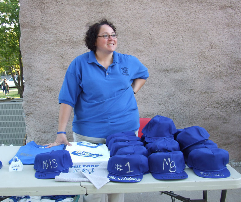 Image: Winona Crumpton — Winona Crumpton manning the cheerleading booth.