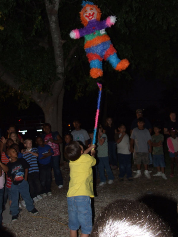 Image: Pinata Fun — Reach a little higher!