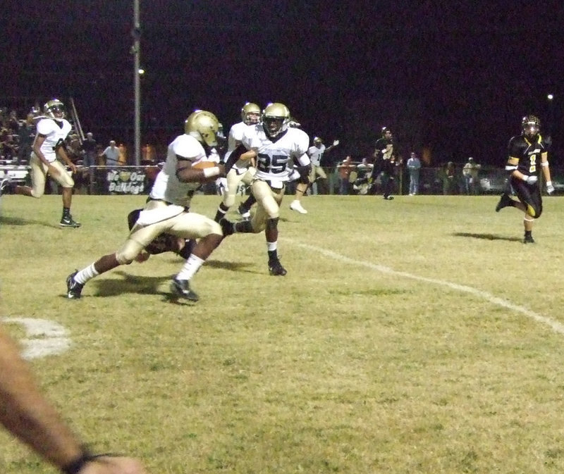 Image: Jasenio Anderson — Anderson gained yardage for the play.