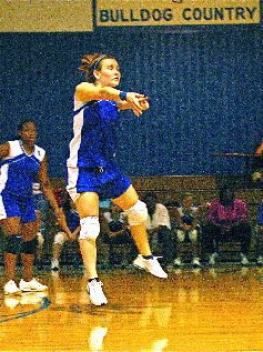 Image: Bumping the ball. — Lady Bulldogs work hard to help Milford to an 8-4 season, with a 4-0 record in district play.