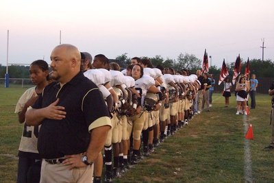 Image: Italy Gladiators at attention — Gladiators Salute the flag.