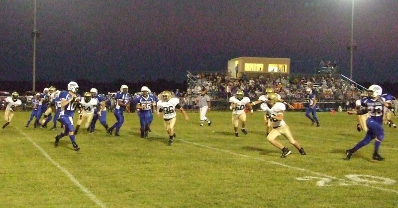 Image: Frost on offense — Frost’s #10-Sam Stroder passes to #22-Ty Ritterbach.