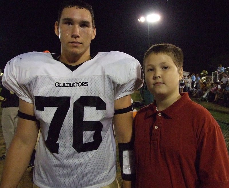 Image: Sugar and Tristan — Gladiators look serious, even on the sidelines.