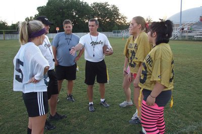 Image: The Coin Toss — Coaches, Ward, Coker and Holley brave the classes.