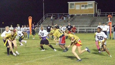 Image: DeMoss Runs For Yards — DeMoss gains yardage.