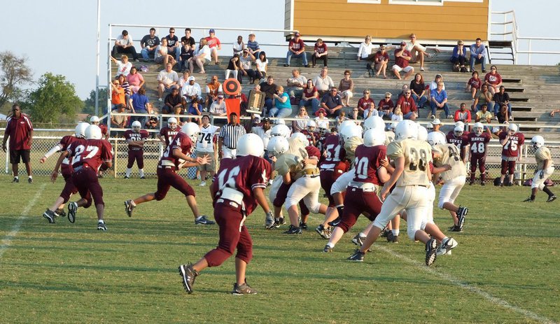 Image: Meeting in the middle — 7th grade offense and defense fight to the finish.
