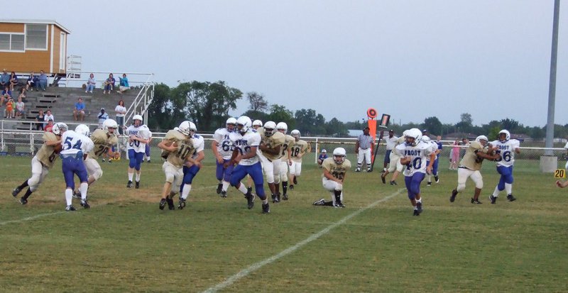Image: Running with the Bears — #10-Chase Hamilton runs the ball.