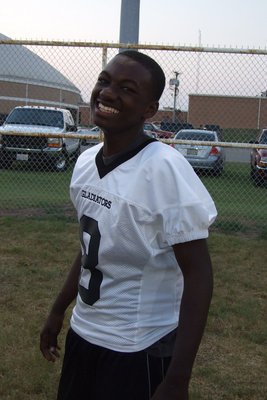 Image: Corn Chips — #8-Corrin Frazier cheeses for the camera.